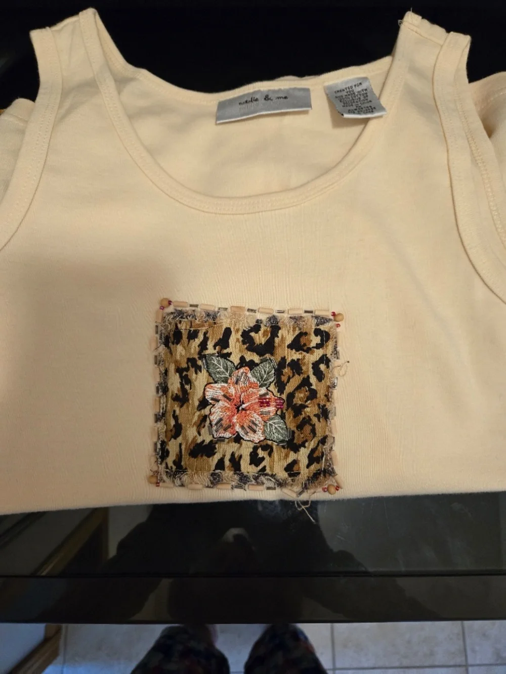 2 Piece skort and tank top, top is PM and bottom is PS. Skort is roomy.